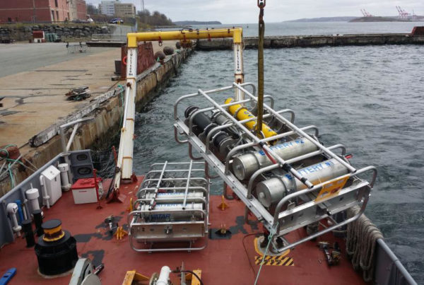 The CAATEX transmitter packages each containing an M72-1000 C-Bass sound source being onboarded for calibration in the Bedford Basin, Halifax, NS.