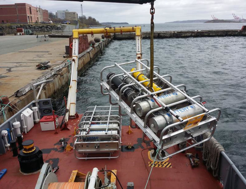The CAATEX transmitter packages each containing an M72-1000 C-Bass sound source being onboarded for calibration in the Bedford Basin, Halifax, NS.